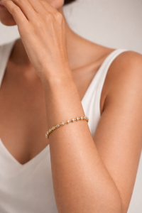 Pulsera de oro amarillo 18k, diseño tenis de diamantes espaciados